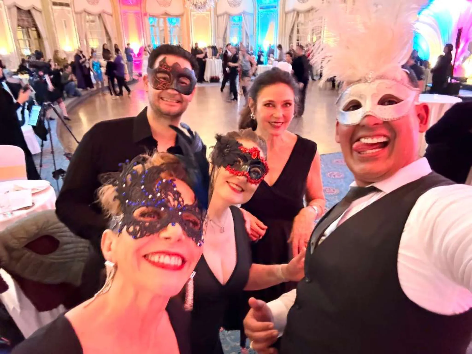 VW Dance students wearing masks at an elegant masquerade ballroom social evening